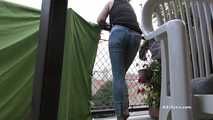 Desperation pee in jeans on balcony