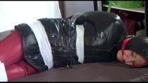 Mara tied and gagged on bed with tape, cuffs and a cloth gag wearing a black/red crazy sensation downwear (Video)