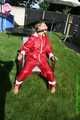 Watch Sandra enjoying beeing bound and gagged in her shiny nylon Rainsuit with a special nylon Hood 