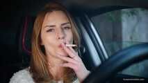 Meet Anastasia in her car while she is smoking two 120mm all white cigarettes