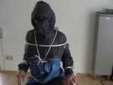 5 short Videos with Katharina tied and gagged in shiny nylon rainwear from 2005-2008