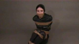Get 4 classic videos with Lupi wearing shiny nylon rainwear beeing tied and gagged