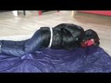02:40 Min. video with Alina tied and gagged in shiny downwear