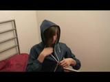 Alina lolling in a bed wearing supersexy blue rainwear (Video)