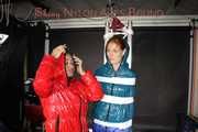 SEXY RONJA wearing shiny nylon downwear being tied and hooded with tapes from Stella on a rack (Pics)