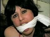 40 Yr OLD SEXY HAIRDRESSER, BANDANA CLEAVE GAGGED, NYLON STOCKING STUFFED IN HER MOUTH BAREFOOT, PANTYLESS, & HANDGAGGED WHILE GETTING A DILDO SHOVED IN HER (D52-6)