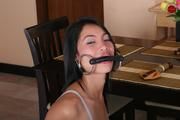 Cute Bound and Gagged Asian is Sitting on the Stool all Helpless and Ready