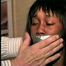 BLACK FEISTY & CUTE SARAH IS TAPE GAGGED, MOUTH STUFFED, TIED WITH RAWHIDE & TIGHTLY HANDGAGGED (D53-16)