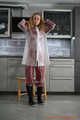 Miss Alice in Nylon rainsuit covered with transparent raingear