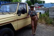 Nude posing at a Jeep