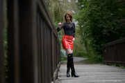 Miss Petra in hot vinyl skirt and overknee boots at the photo shoot