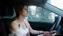 Meet Anastasia in her car while she is smoking two 120mm all white cigarettes