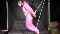 Sexy ***SANDRA*** wearing a hot pink oldschool downbib and a down jacket being tied and gagged with ropes and a clothgag hanging on the ceiling  (Video)