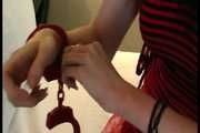 Devin: Goth Girl in red Cuffs (MPG)