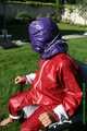 Watch Sandra enjoying beeing bound and gagged in her shiny nylon Rainsuit with a special nylon Hood 