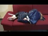 03:00 Min video with Samantha tied and gagged in a shiny nylon down coat