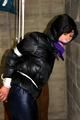 Julia tied and gagged in down jacket (cellar)